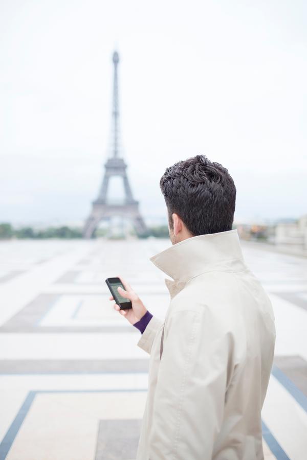 Businessman Admiring Eiffel Tower in Paris