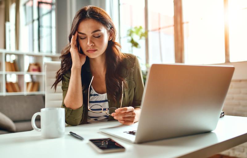 Woman in office sick