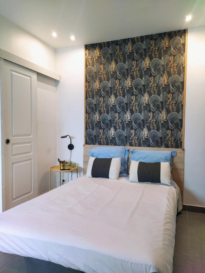 Bed in Appart-Hôtel Le Djurdjura Suresnes-Nanterre-La defense