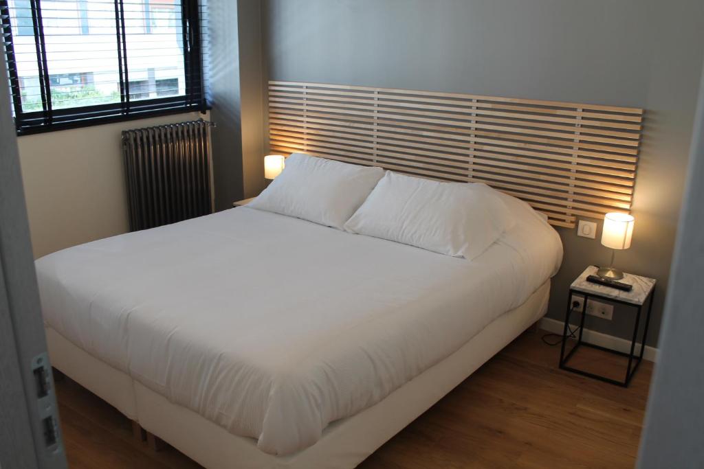 Bed in Appartements Paris Boulogne