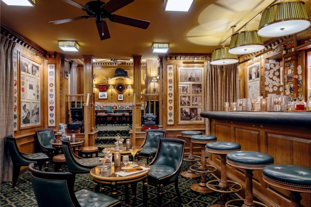 Interior of Bar Hemingway in Paris, featuring a stylish bar area with elegant decor and a warm, inviting atmosphere.