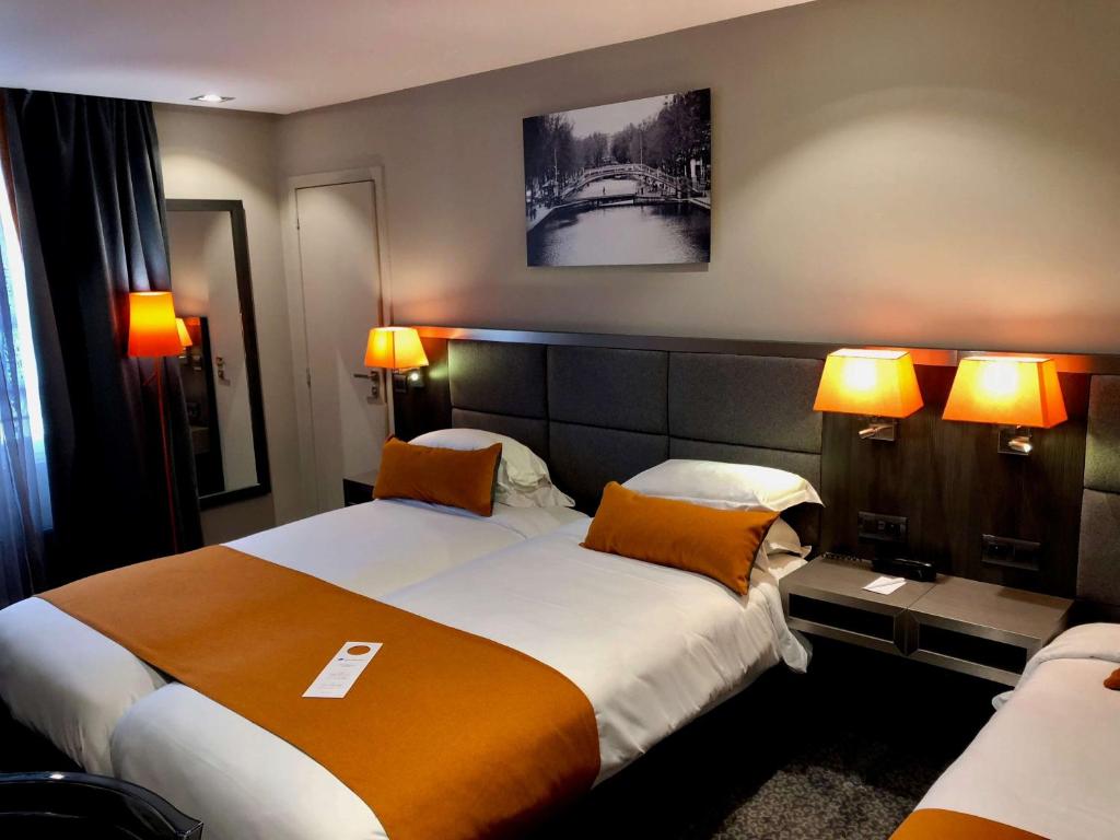 The rooms at Best Western Empire Elysees boast a harmonious blend of comfort and sophistication, offering plush furnishings, contemporary decor, and ample natural light.