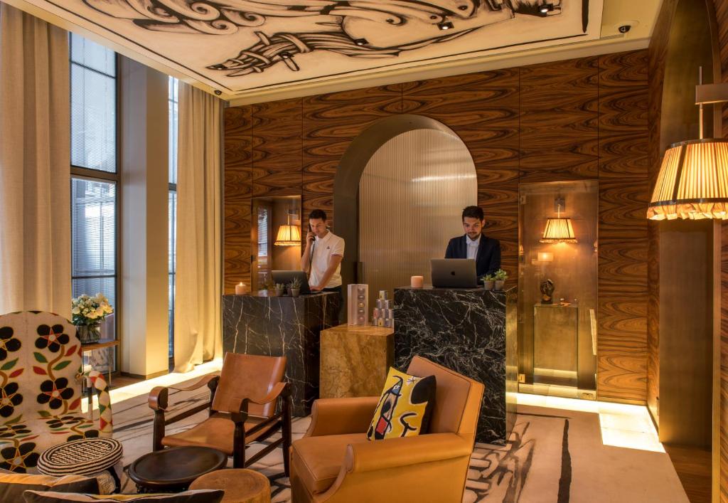 Stepping into the lobby of Brach Paris is a sensory delight, with its opulent design, luxurious furnishings, and ambient lighting creating an inviting and sophisticated atmosphere.