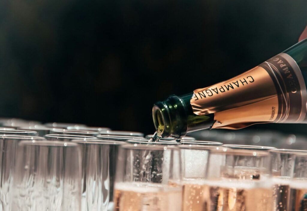 Pouring champagne on glasses