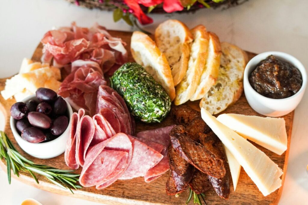 Fancy charcuterie board with slice meat and cheese