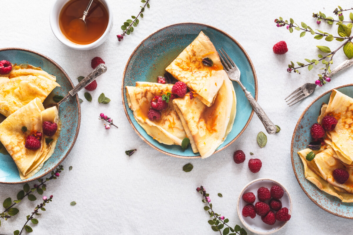 Crêpe Suzette with Citrus Sauce and Rum and Raspberries for Candlemas