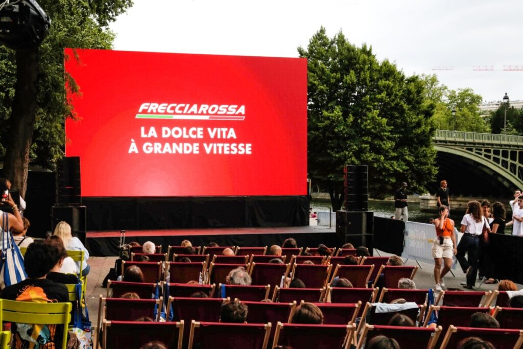 Crowd and participants of the Dolcevita-sur-Seine in Paris, France