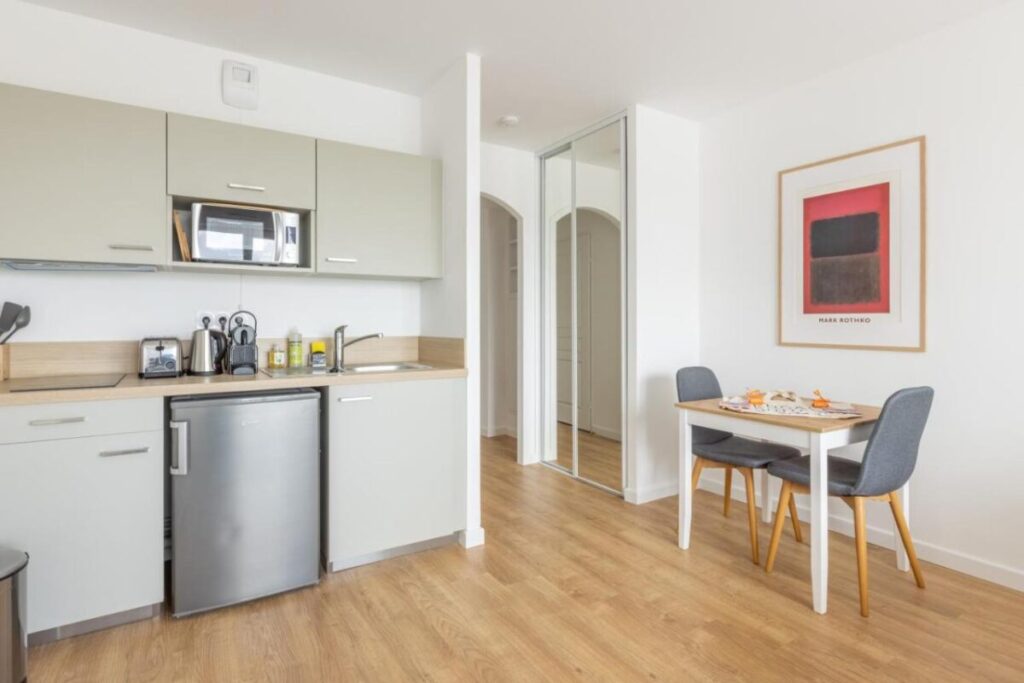 Kitchen interior and amenity in Edgar Suites Châtillon