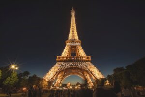 Illuminated Eiffel Tower at night in Paris, France