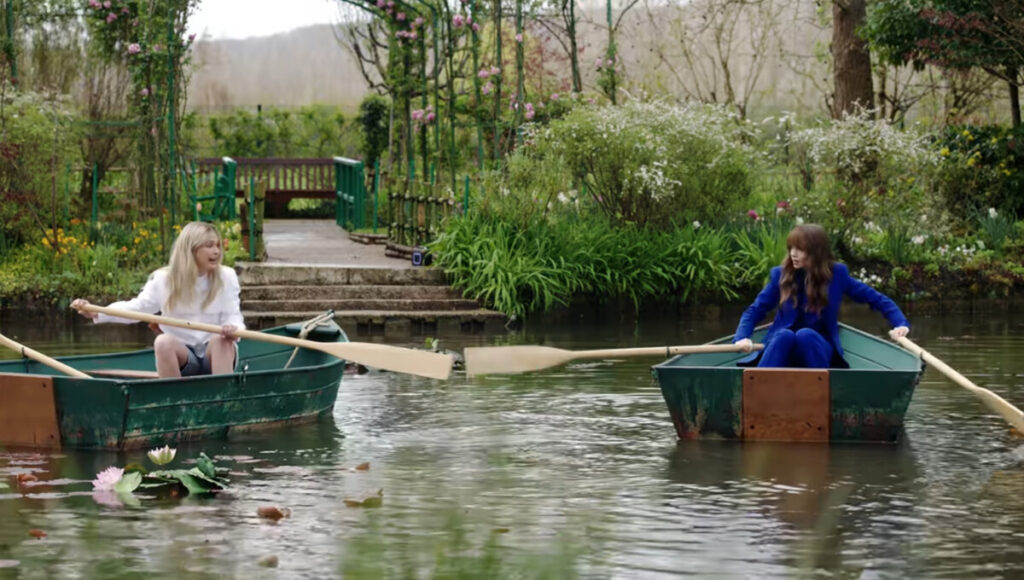Camille Razat as Camille and Lily Collins as Emily at Giverny, France, in Emily in Paris, season four, episode two