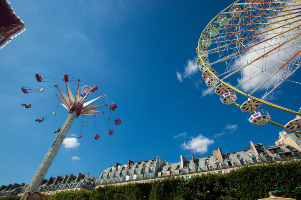 Fête Foraine des Tuileries fun fair rides at Tuileries Garden in Paris, France