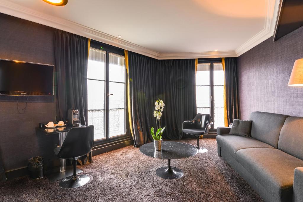 First Hotel Paris Tour Eiffel offers a range of amenities including a fitness center, spa facilities, and a stylish lobby lounge.