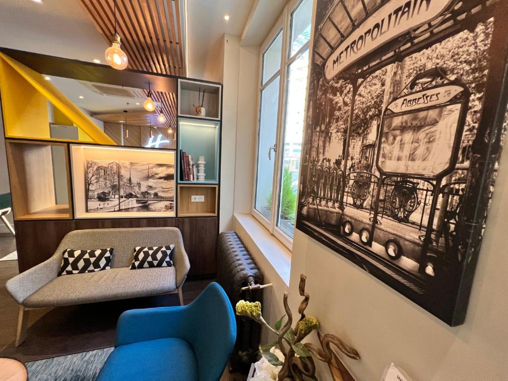 Holiday Inn Paris-Auteuil, an IHG Hotel amenities: Image featuring a gym, restaurant, and lobby.