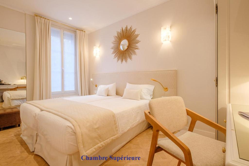 Hotel Boileau Bedroom: Immerse yourself in a haven of comfort and style within our meticulously designed guest rooms.