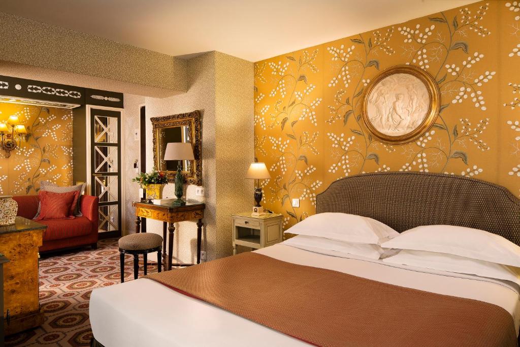 The accommodations at Hôtel des Grands Hommes include a tasteful blend of modern conveniences and traditional Parisian elegance.