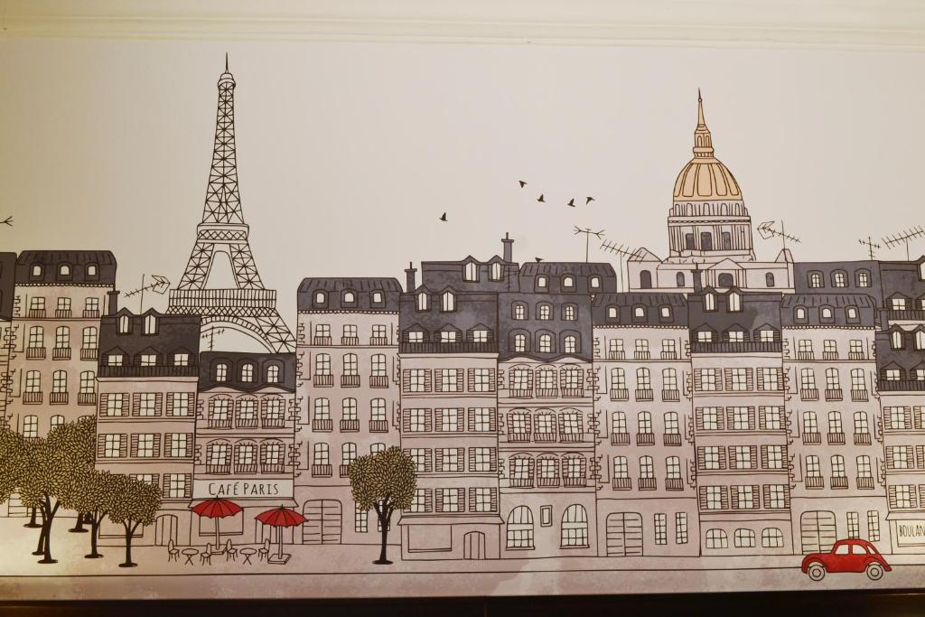 Hôtel de Lille welcomes guests with timeless elegance, as seen in its charming façade and inviting entrance.