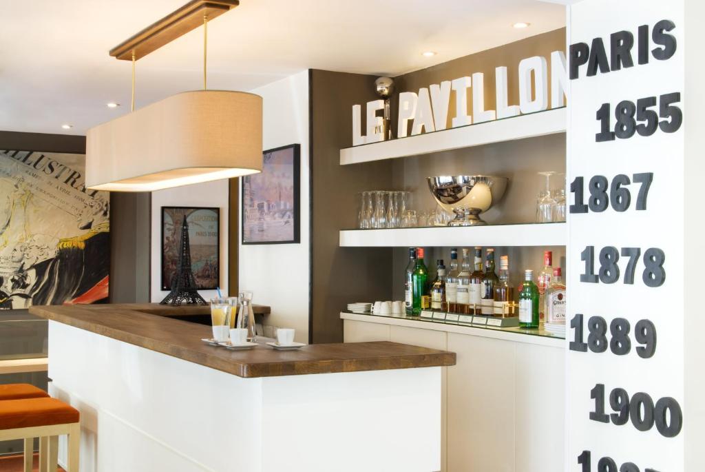 Hôtel de Lille's lobby is a captivating blend of luxury and intimacy, featuring opulent furnishings, soft ambient lighting, and attentive staff.