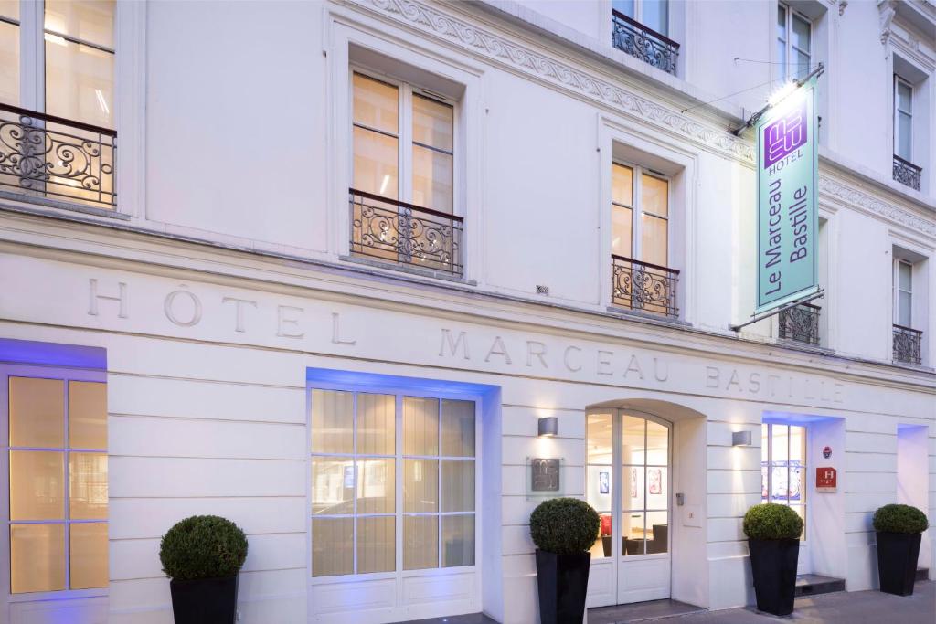 Hôtel Le Marceau Bastille in Paris, showcasing its elegant facade and welcoming entrance.