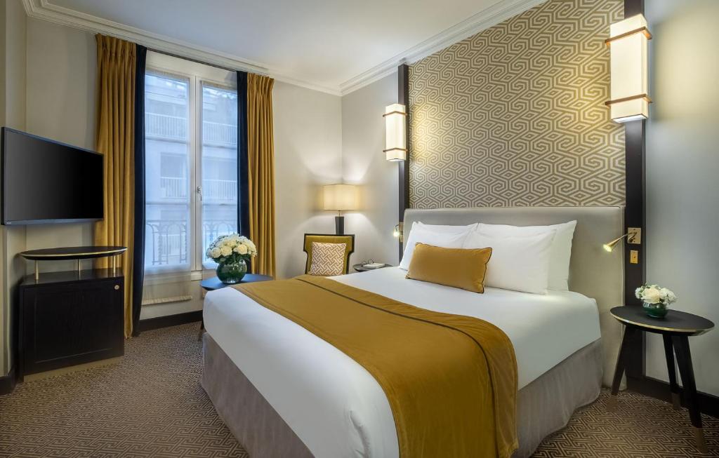 "Immerse yourself in luxury at Hôtel Le Marquis by Inwood Hotels, where each room features contemporary design, upscale furnishings, and thoughtful amenitie