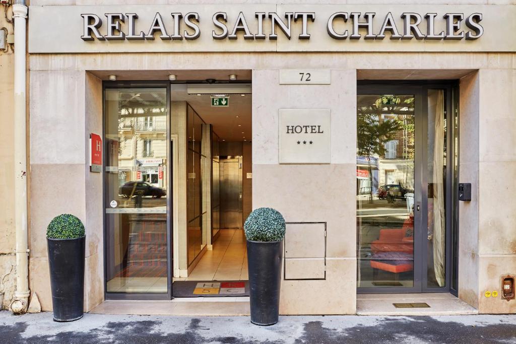 Hôtel Le Relais Saint Charles: A charming boutique hotel exterior with classic French architecture and a welcoming entrance