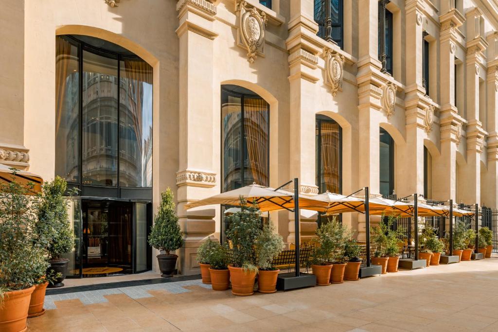 Hôtel Madame Rêve's lobby is a captivating space, blending artistic flair with a cozy ambiance.