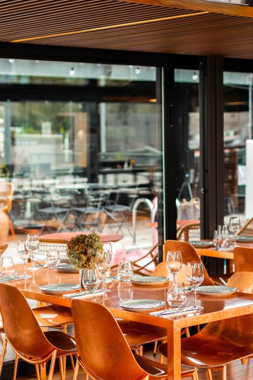 Savor a culinary journey at Hôtel Artus where dining is an exquisite fusion of flavors and ambiance.