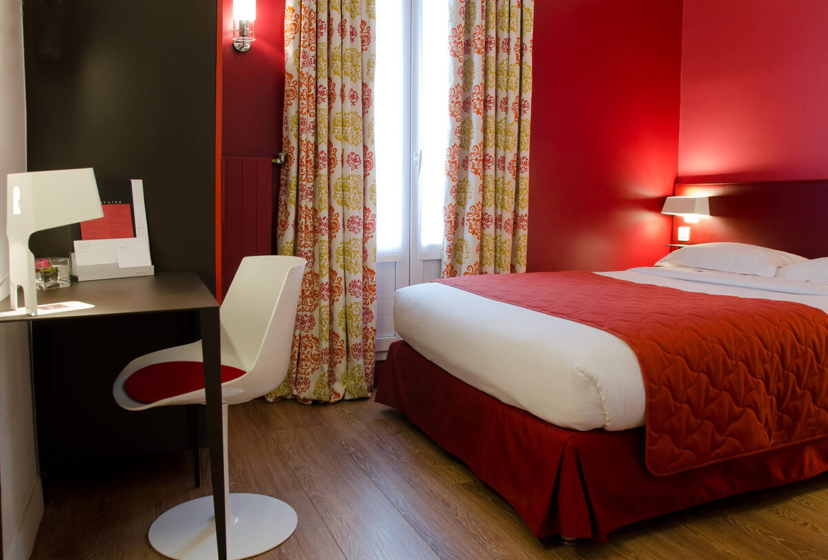 Bedroom interior in Hotel Tivoli Etoile