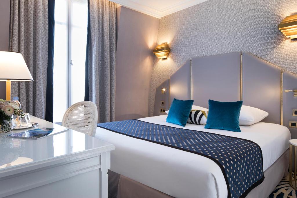 Hôtel Victor Hugo's rooms epitomize luxury with tasteful furnishings, modern amenities, and a charming Parisian ambiance.