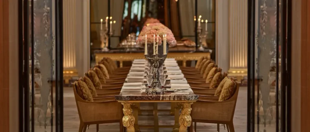Interior of Jean Imbert au Plaza Athénée in Paris, showcasing elegant tables and luxurious seating arrangements