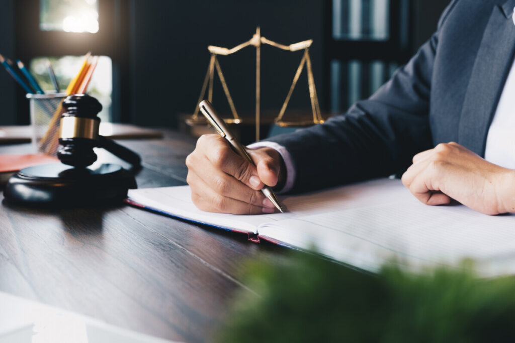Lawyer working and signing documents