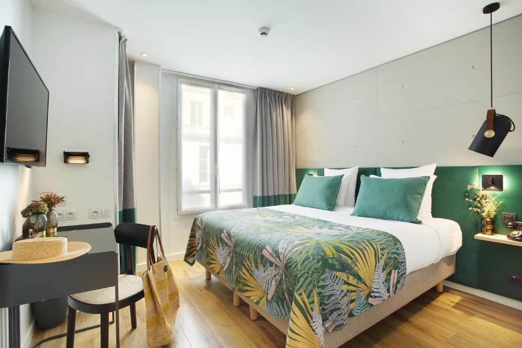 Image showcasing a room at Le Basile Hôtel, featuring modern décor and cozy ambiance.