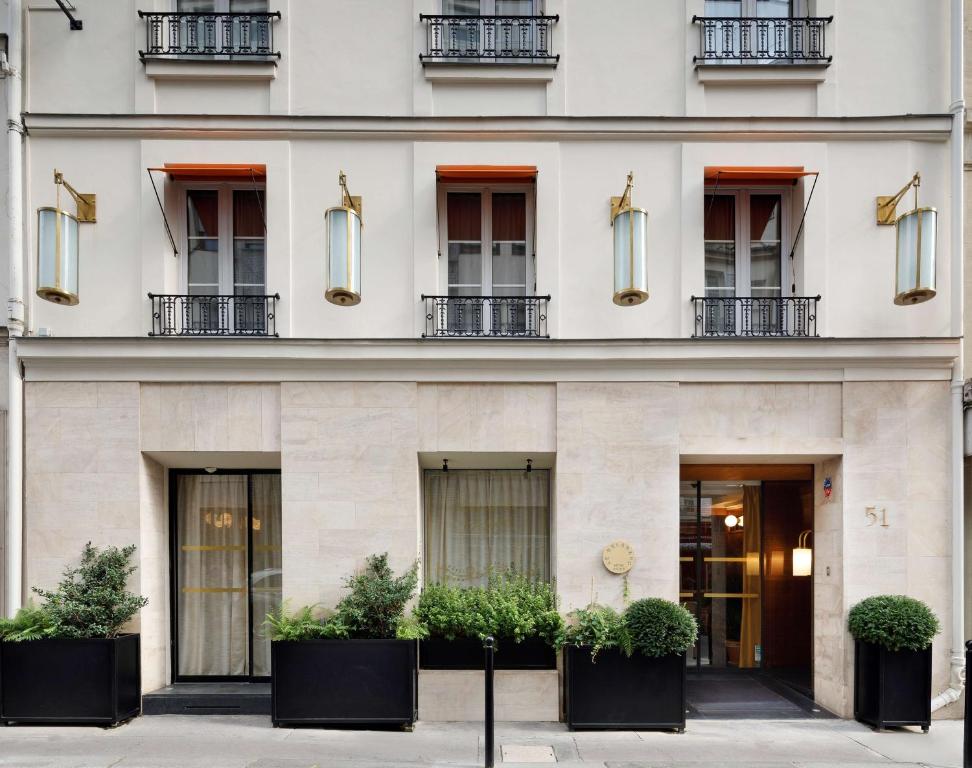 Front of Le Belgrand Hotel Paris Champs Elysees, Tapestry Collection by Hilton building