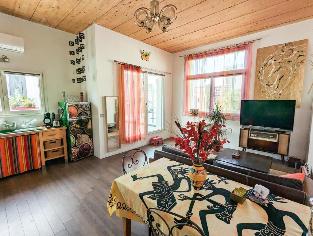 Living room amenities in Le Penthouse de Boulogne