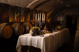 Neatly dressed table with a cloth at Les Caves du Louvre wine bar in Paris, showcasing a refined atmosphere.