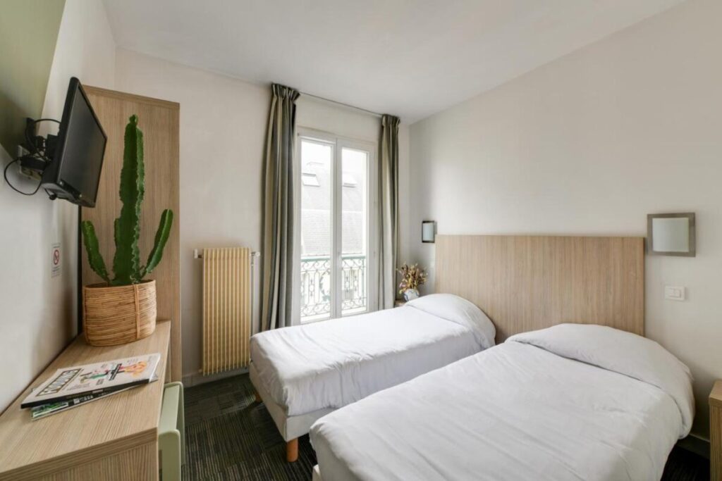 Louisa Hotel Paris room with two beds