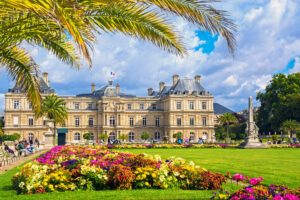 Beautiful palace nestled in the vibrant Luxembourg Gardens of Paris, France, showcasing classic architecture.