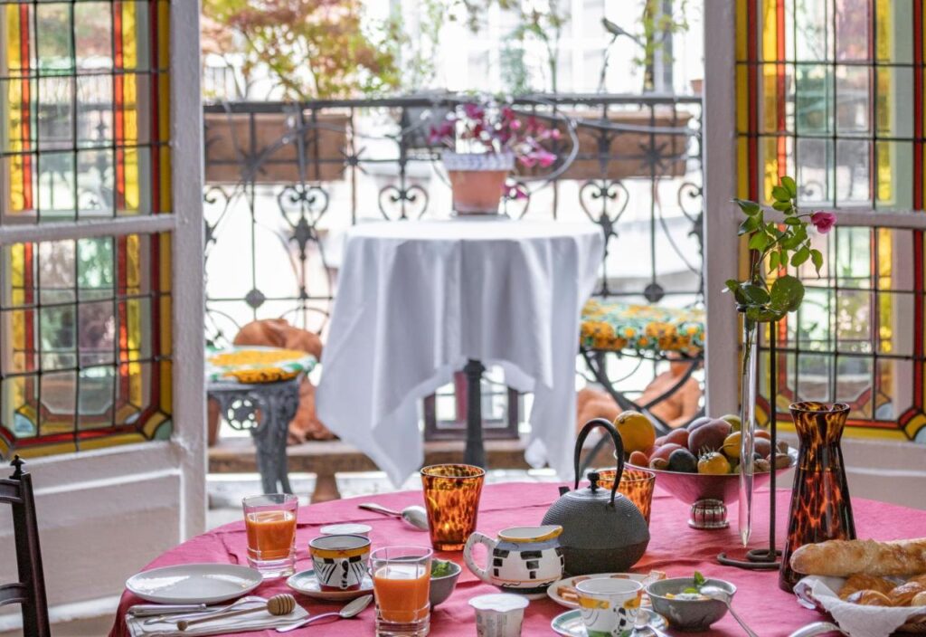 Food and dining table inMaison des Chaumes-Paris