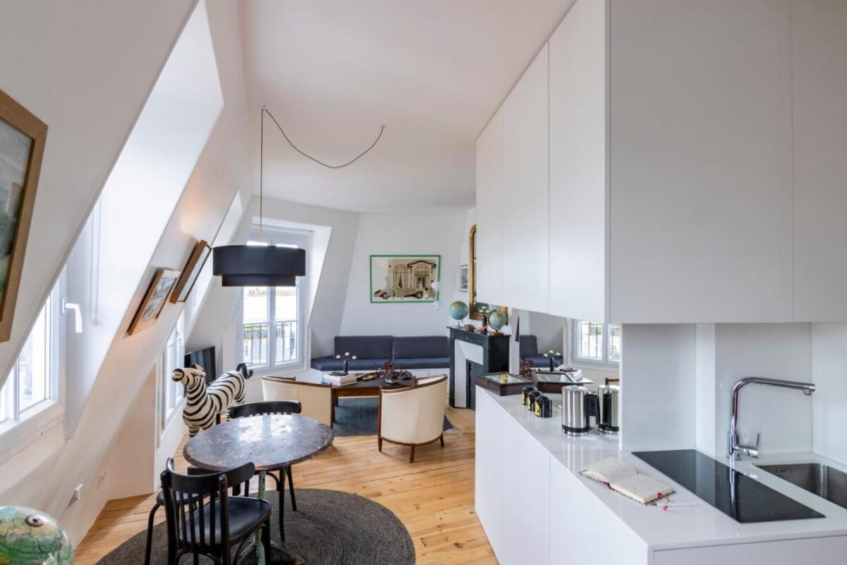 Room interior and kitchen in Maison des Chaumes-Paris