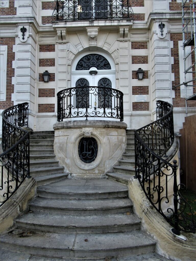 The intricate stairway within Maison Lorenz, reflecting the exquisite interior design.