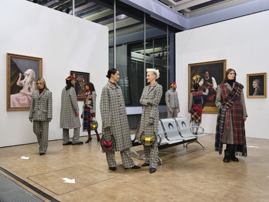 Models wearing Marine Serre Clothing Brand pieces