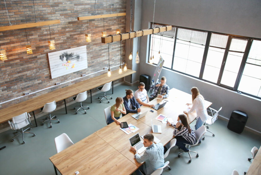 Workers having a meeting on a spacious meeting room 