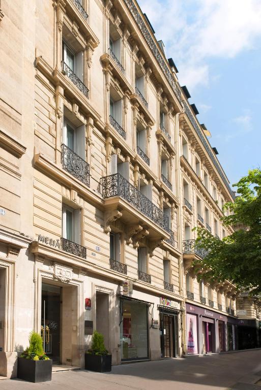 First impressions of Melia Paris Champs Elysées unveil a blend of opulence and modernity, with its grand facade and contemporary architectural details.