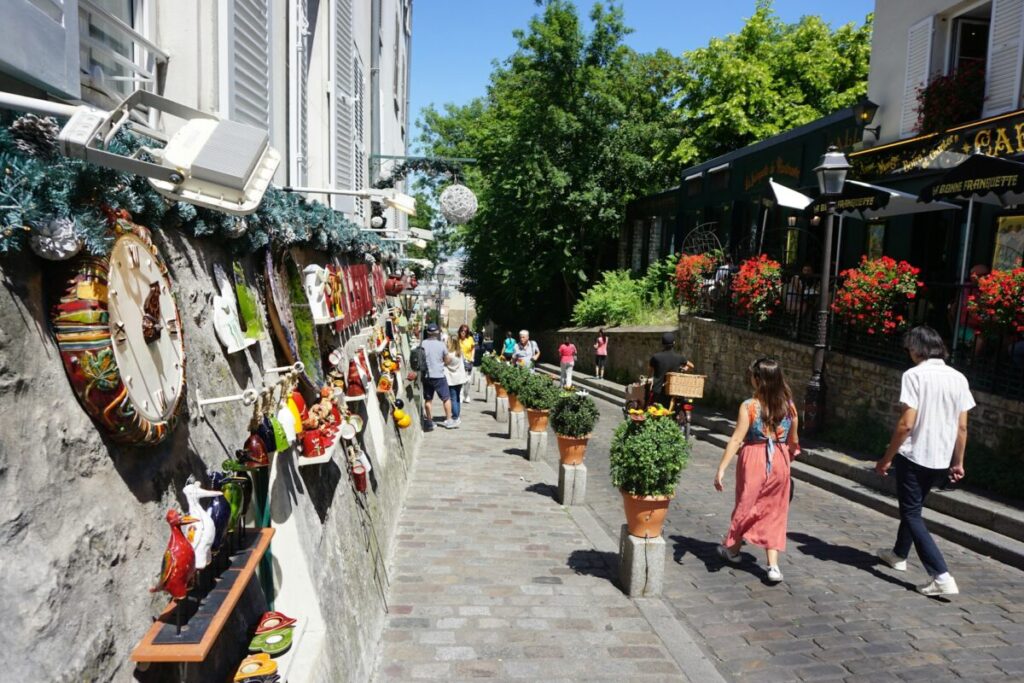 Tourist walking in Montmartre, Paris streets