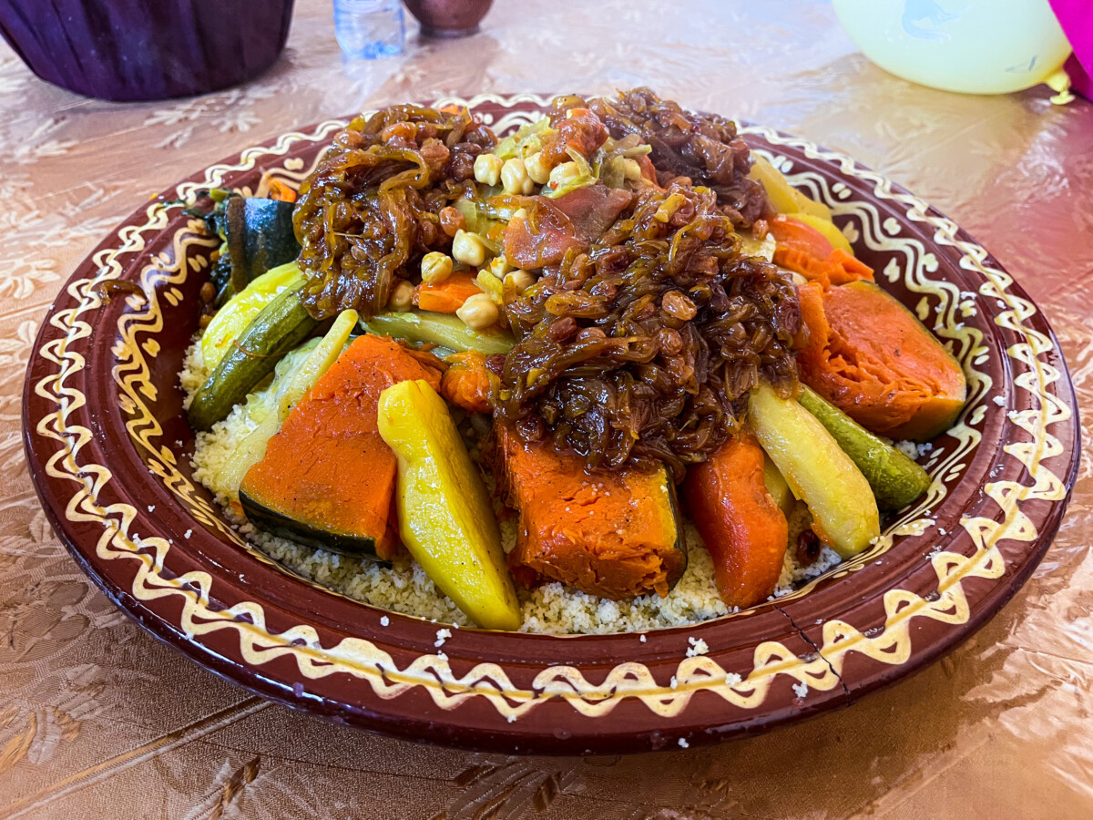 Delicious Friday couscous with sweet rasins on top of it with sugar and onion