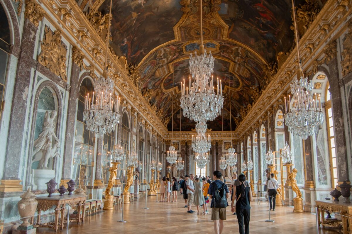 Tourists and interior of the Palace of Versailles, Versailles, France