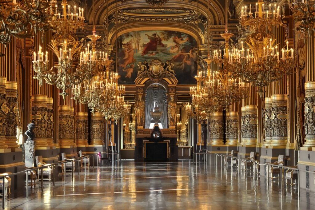 The opulent Hall of Mirrors at Palais Garnier, showcasing stunning architecture and intricate details.