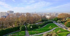 Scenic view of the Paris skyline from Parc de Belleville, highlighting famous landmarks in the 20th arrondissement