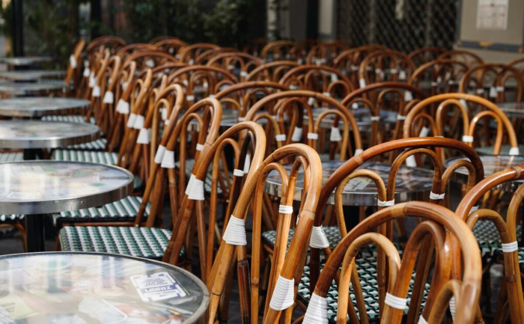 Outdoor seats and tables of a bistrot in Paris, France