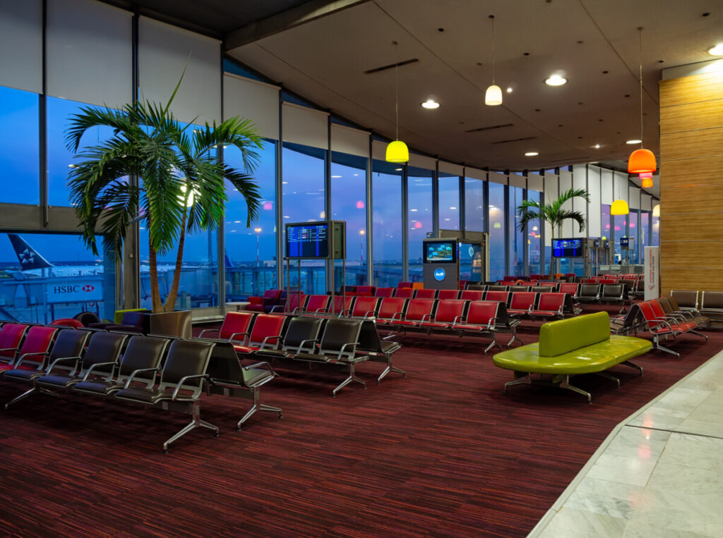 Departure hall and chairs of Paris Charles de Gaulle Airport in Roissy-en-France, France