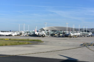 Planes on a terminal at Paris Charles de Gaulle Airport in Roissy-en-France, France